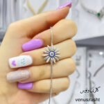 دسنبند نقره دخترانه طرح چشم و نظر و گل بابونه