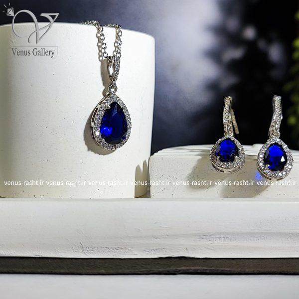 InShot_۲۰۲۳۰۸۲۶_۱۵۰۷۳۲۶۱۸-600x600-1.jpg نیم ست نقره طرح اشک با کریستال آبی سواروسکی - Image 1