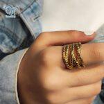 انگشتر زنانه چندلاین استیل طلایی مدل بافت