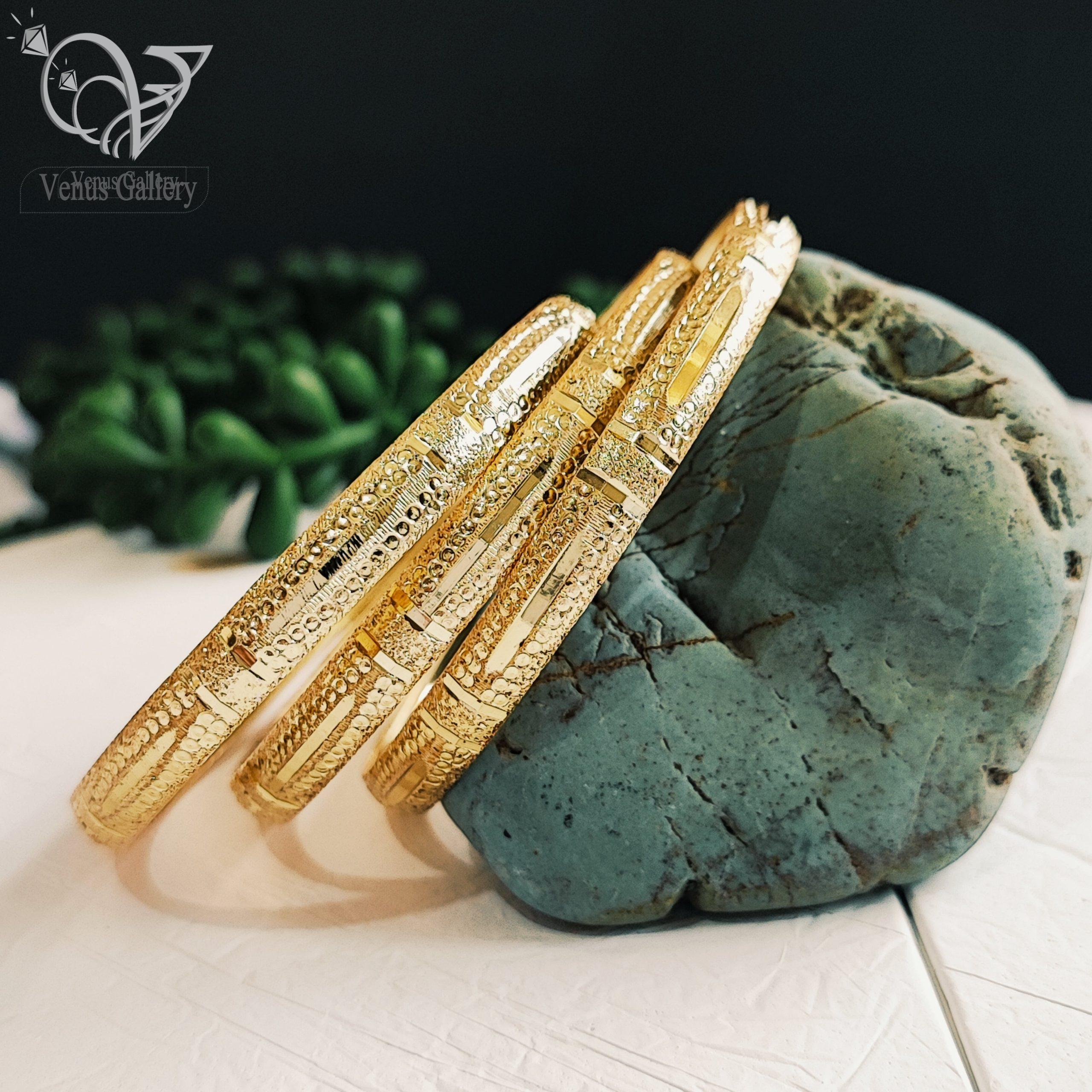 InShot_۲۰۲۴۰۴۲۹_۱۸۴۵۱۱۶۹۲-min-scaled-1.jpg النگو طلاروس طرح طلا - Image 1