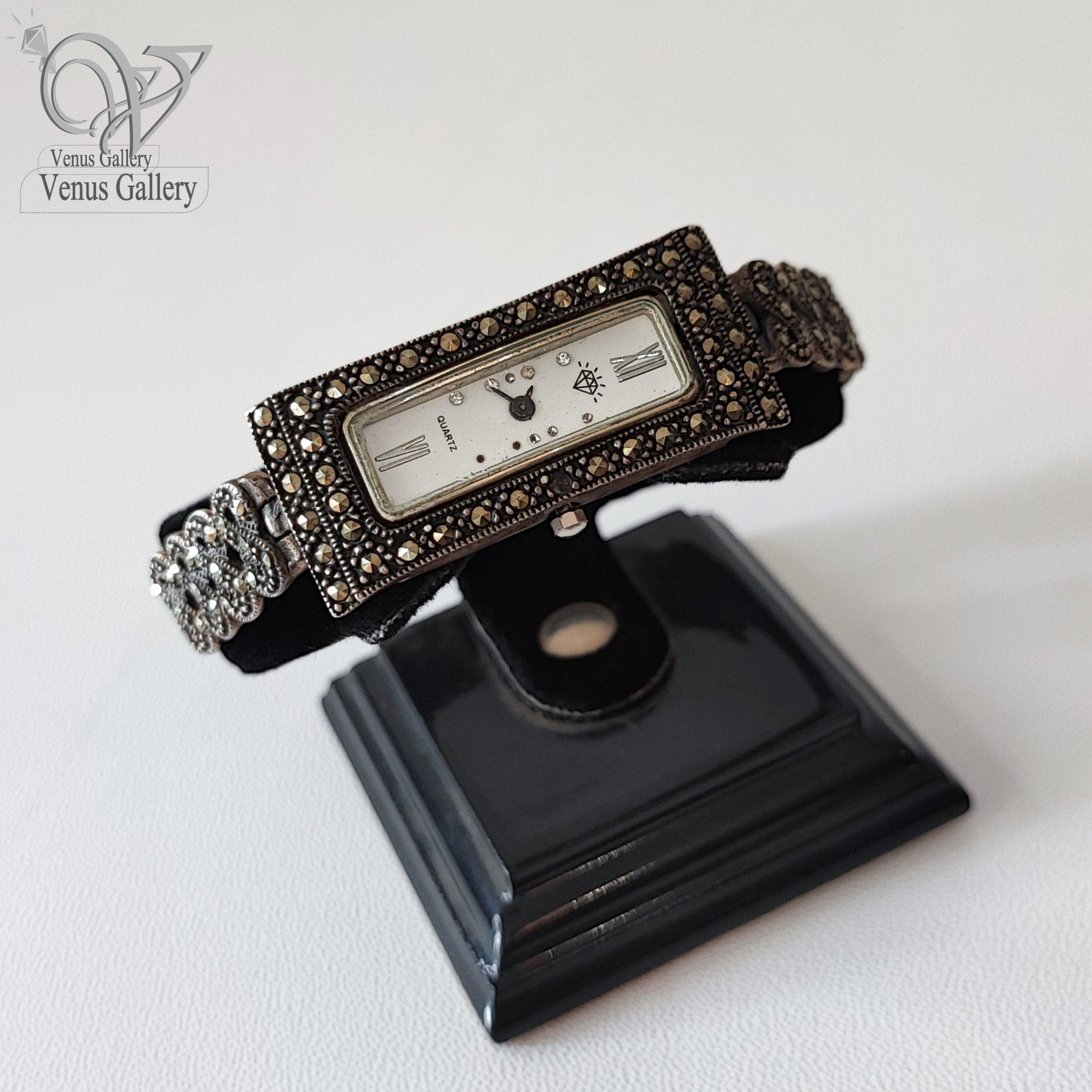 InShot_۲۰۲۴۰۵۳۰_۱۸۰۷۵۰۲۷۹-min-scaled-1.jpg ساعت مچی نقره زنانه نگین مارکازیت سیاه قلم - Image 1