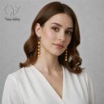 گوشواره آویز نقره طرح گوی تراش‌خورده